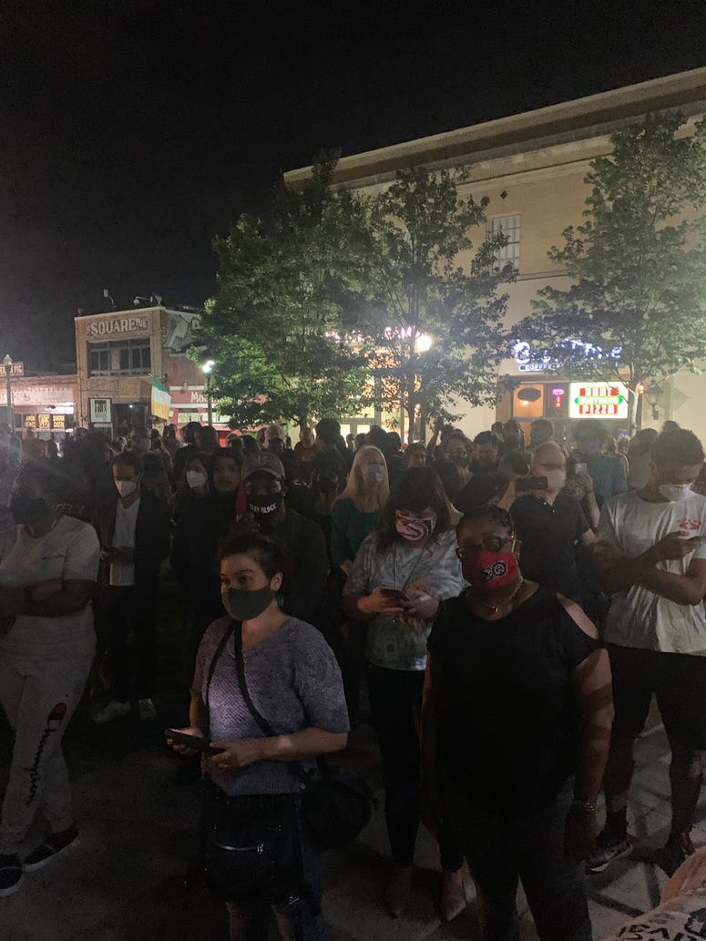 A crowd gathered to witness the removal of the Confederate monument in Decatur Square A crowd gathered to witness the removal of the Confederate monument in Decatur Square