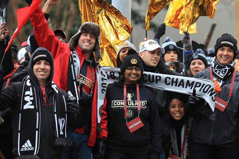 Atlanta United fans celebrate during victory parade Atlanta United fans celebrate during victory parade