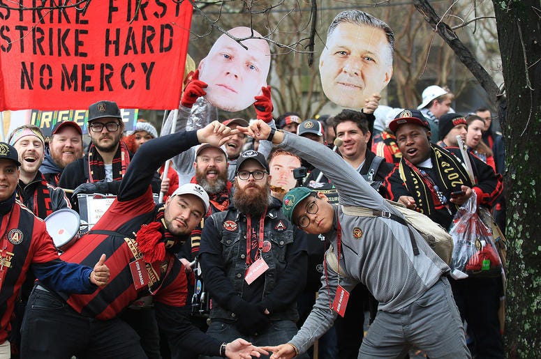 Atlanta United fans celebrate during victory parade Atlanta United fans celebrate during victory parade