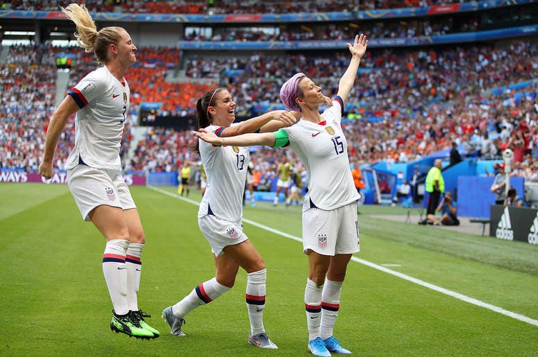 Megan Rapinoe of the USA celebrates with teammates after scoring her team's first goal during the 2019 FIFA Women's World Cup France Final match between The United States of America and The Netherlands at Stade de Lyon on July 07, 2019 in Lyon, France. Megan Rapinoe of the USA celebrates with teammates after scoring her team's first goal during the 2019 FIFA Women's World Cup France Final match between The United States of America and The Netherlands at Stade de Lyon on July 07, 2019 in Lyon, France.