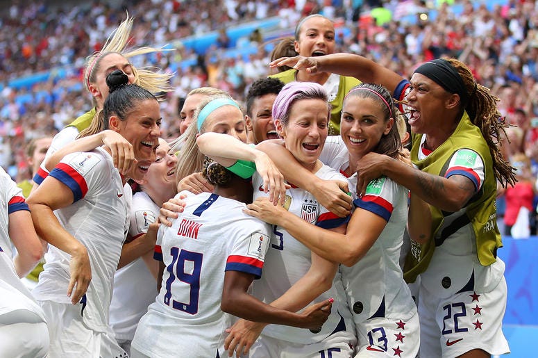 Megan Rapinoe of the USA celebrates with teammates after scoring her team's first goal during the 2019 FIFA Women's World Cup France Final match between The United States of America and The Netherlands at Stade de Lyon on July 07, 2019 in Lyon, France. Megan Rapinoe of the USA celebrates with teammates after scoring her team's first goal during the 2019 FIFA Women's World Cup France Final match between The United States of America and The Netherlands at Stade de Lyon on July 07, 2019 in Lyon, France.
