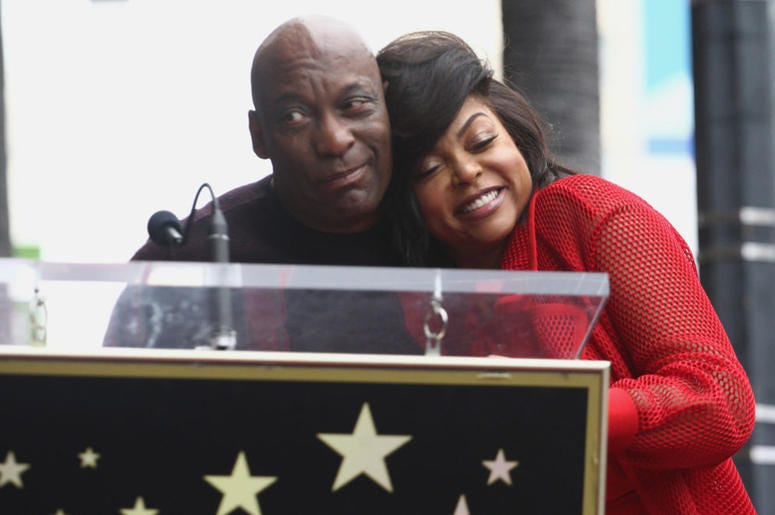 John Singleton and Taraji P. Henson attend a ceremony honoring Taraji P. Henson with a star on The Hollywood Walk of Fame on January 28, 2019 in Hollywood, California. John Singleton and Taraji P. Henson attend a ceremony honoring Taraji P. Henson with a star on The Hollywood Walk of Fame on January 28, 2019 in Hollywood, California.
