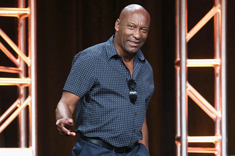 Director John Singleton speaks onstage at 'The People v. O.J. Simpson: American Crime Story' panel discussion during the FX portion of the 2016 Television Critics Association Summer Tour at The Beverly Hilton Hotel on August 9, 2016 in Beverly Hills, Cali Director John Singleton speaks onstage at 'The People v. O.J. Simpson: American Crime Story' panel discussion during the FX portion of the 2016 Television Critics Association Summer Tour at The Beverly Hilton Hotel on August 9, 2016 in Beverly Hills, Cali