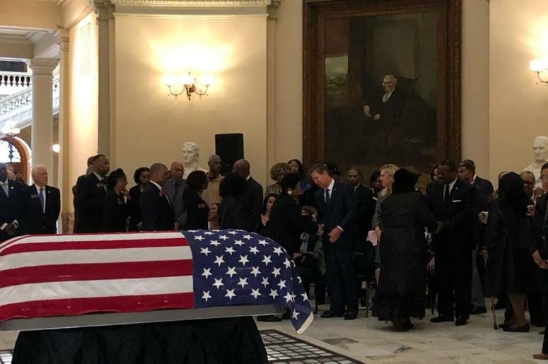 The flag draped coffin of former GA State Senator Leroy Johnson sits inside the Capitol rotunda The flag draped coffin of former GA State Senator Leroy Johnson sits inside the Capitol rotunda