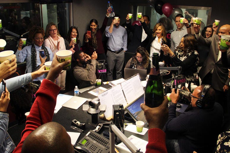 V-103's staff toasts The Morning Culture on the show's first day on air V-103's staff toasts The Morning Culture on the show's first day on air