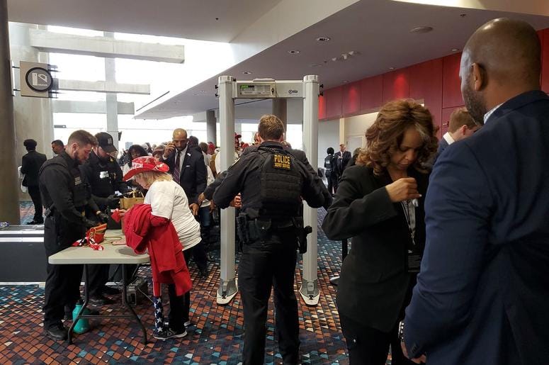 Trump supporters took their turn through security Friday for his Atlanta visit Trump supporters took their turn through security Friday for his Atlanta visit