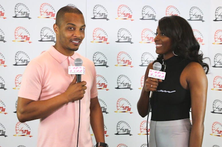 T.I & Liz Backstage At The V-103 Car & Bike Show T.I & Liz Backstage At The V-103 Car & Bike Show