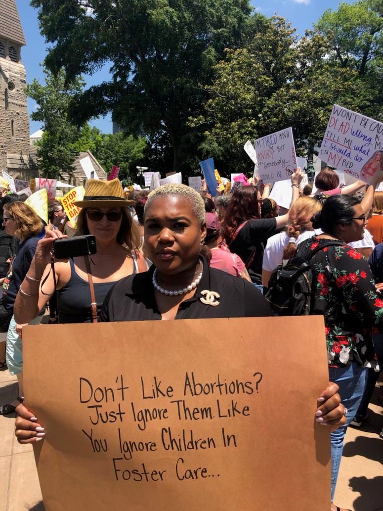 GA State Representative Erica Thomas, who is 7 months pregnant, addressed Tuesday's abortion ban protest at the GA Capitol GA State Representative Erica Thomas, who is 7 months pregnant, addressed Tuesday's abortion ban protest at the GA Capitol