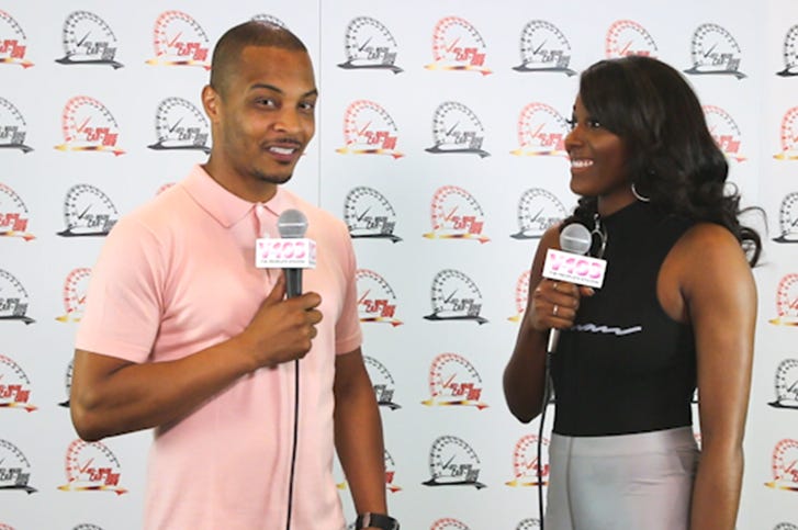 T.I & Liz Backstage At The V-103 Car & Bike Show T.I & Liz Backstage At The V-103 Car & Bike Show