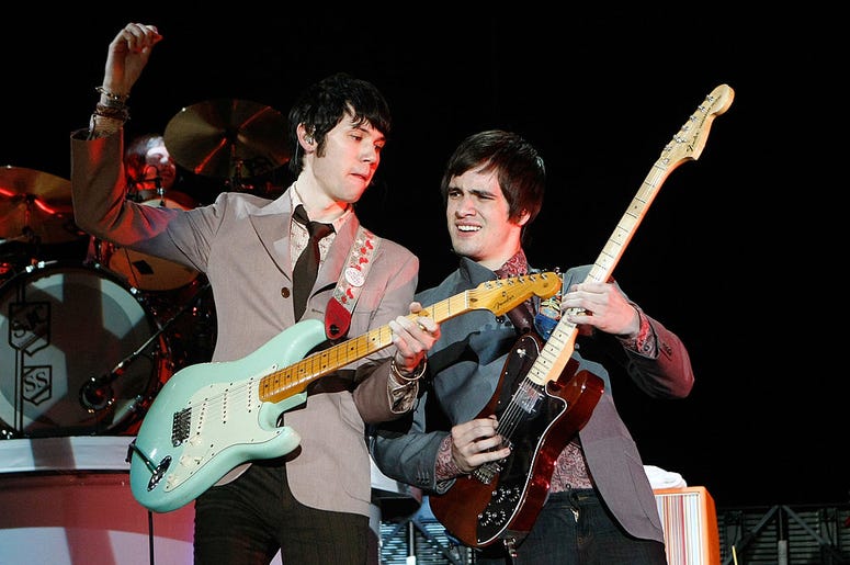 Panic at the Disco guitarist Ryan Ross (L) and frontman Brendon Urie perform during the Ambassadors of Rock Tour at the Hard Rock Hotel & Casino October 9, 2008 in Las Vegas, Nevada Panic at the Disco guitarist Ryan Ross (L) and frontman Brendon Urie perform during the Ambassadors of Rock Tour at the Hard Rock Hotel & Casino October 9, 2008 in Las Vegas, Nevada