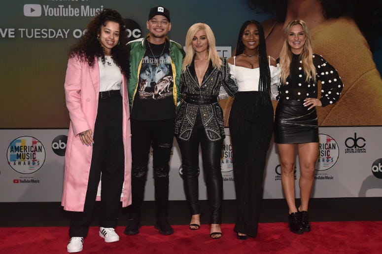 Ella Mai, Kane Brown, Bebe Rexha, Normani & Chelsea Briggs Ella Mai, Kane Brown, Bebe Rexha, Normani and Chelsea Briggs attend the 2018 American Music Awards Nominations Announcement at YouTube Space LA on September 12, 2018 in Los Angeles, California.