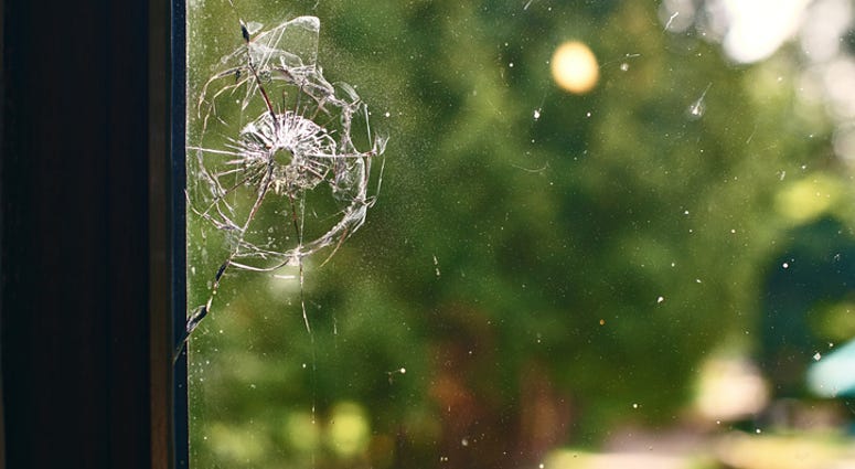 Bullet hole in the window Bullet hole in the window