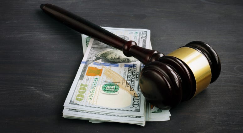 Gavel and money Gavel and money