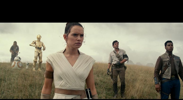 Daisy Ridley, center, co-stars with John Boyega and Oscar Isaac in Star Wars: The Rise of Skywalker