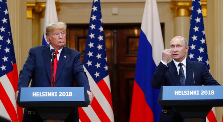 Trump and Putin AP Trump and Putin AP
