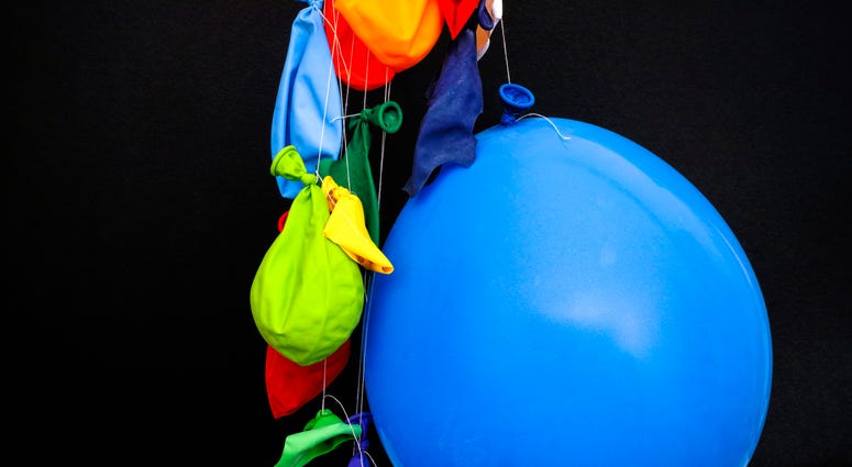 A bunch of deflated balloons