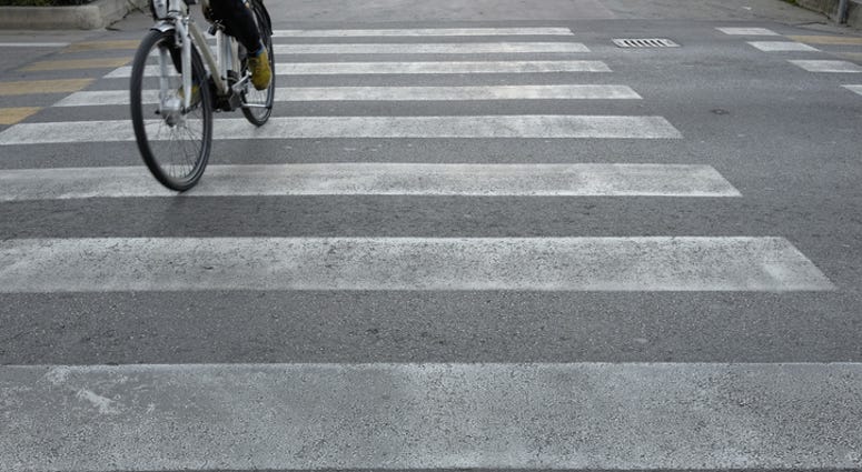 bike in crosswalk bike in crosswalk
