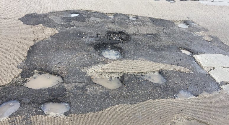 Potholes on Mound Road Potholes on Mound Road