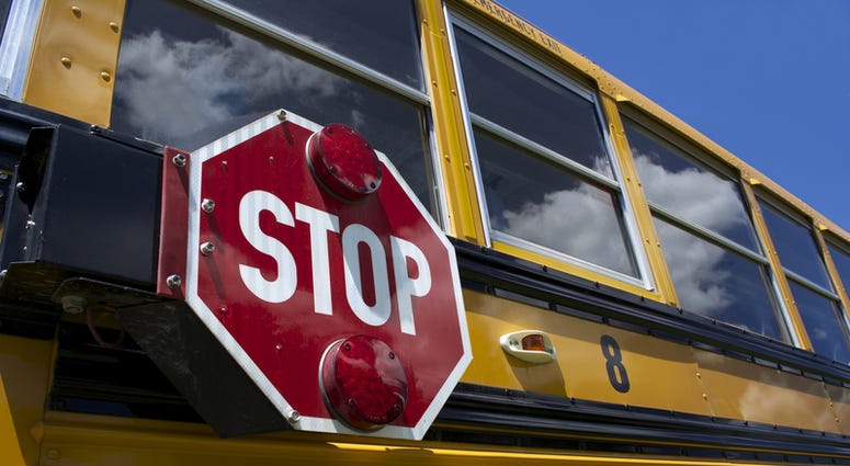 School bus with stop sign School bus with stop sign