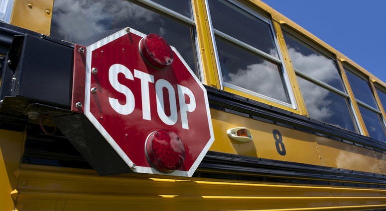 School bus with stop sign School bus with stop sign