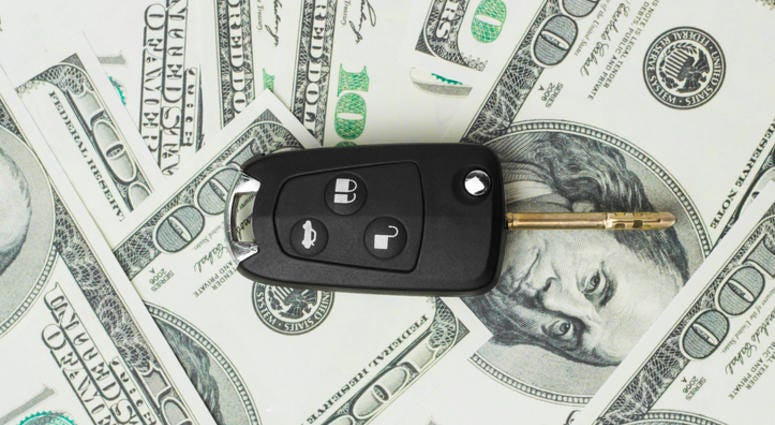 Car key on money Car key on money