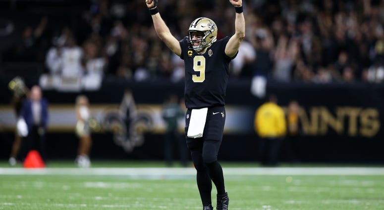 NEW ORLEANS, LOUISIANA - DECEMBER 16: Quarterback Drew Brees #9 of the New Orleans Saint celebrates his second touchdown in the third quarter of the game against the Indianapolis Colts at Mercedes Benz Superdome. (Photo by Jonathan Bachman/Getty Images) Drew Brees
