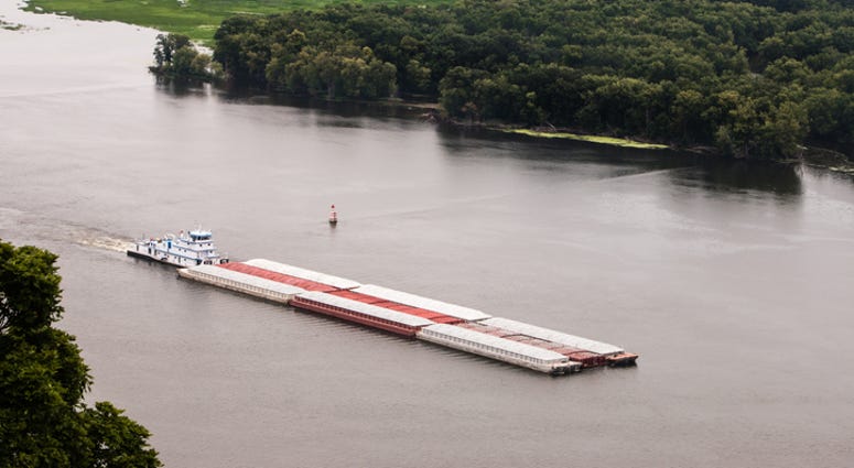 Mississippi River closed after barges collide, towboat sinks--three missing