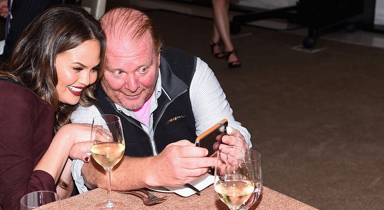 Mario Batali takes a selfie with Chrissy Teigen