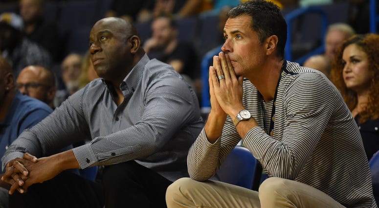 Oct 4, 2017; Ontario, CA, USA; Los Angeles Lakers general manager Rob Pelinka watches the game against the Denver Nuggets with team president Magic Johnson at Citizens Business Bank Arena. Oct 4, 2017; Ontario, CA, USA; Los Angeles Lakers general manager Rob Pelinka watches the game against the Denver Nuggets with team president Magic Johnson at Citizens Business Bank Arena.