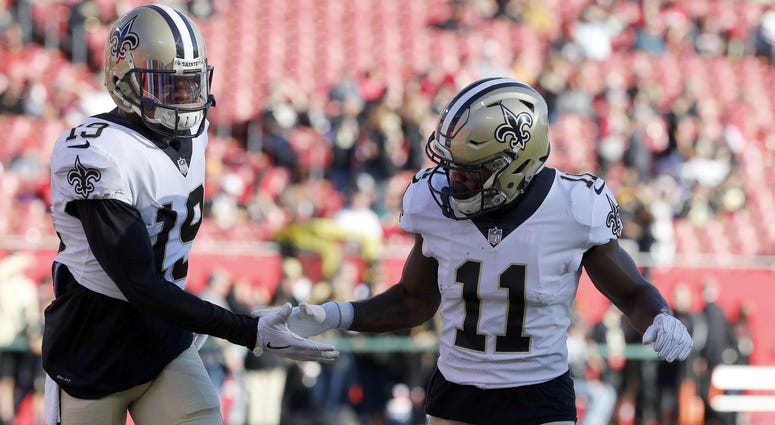 Dec 31, 2017; Tampa, FL, USA; New Orleans Saints wide receiver Ted Ginn (19) and wide receiver Tommylee Lewis (11) work out prior to the game against the Tampa Bay Buccaneers at Raymond James Stadium. Dec 31, 2017; Tampa, FL, USA; New Orleans Saints wide receiver Ted Ginn (19) and wide receiver Tommylee Lewis (11) work out prior to the game against the Tampa Bay Buccaneers at Raymond James Stadium.