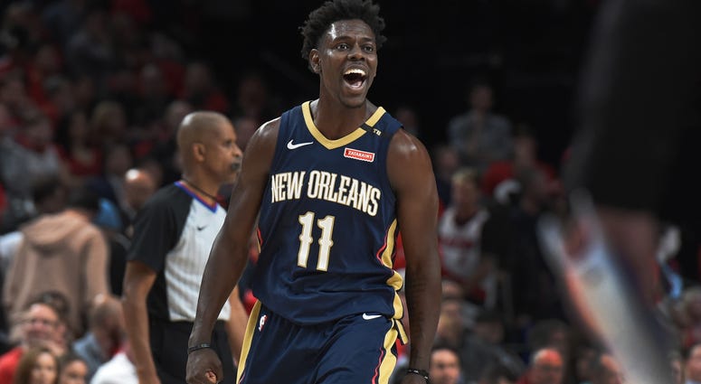 Apr 17, 2018; Portland, OR, USA; New Orleans Pelicans guard Jrue Holiday (11) reacts after scoring late during the fourth quarter in game two of the first round of the 2018 NBA Playoffs against the Portland Trail Blazers at the Moda Center. The Pelicans w Apr 17, 2018; Portland, OR, USA; New Orleans Pelicans guard Jrue Holiday (11) reacts after scoring late during the fourth quarter in game two of the first round of the 2018 NBA Playoffs against the Portland Trail Blazers at the Moda Center. The Pelicans w