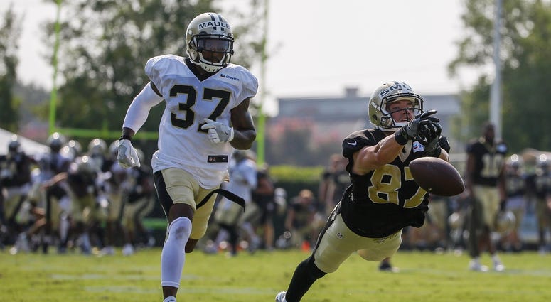 Jul 28, 2018; Metairie, LA, USA; New Orleans Saints wide receiver Josh Smith (87) drops a pass as cornerback Arthur Maulet (37) defends during training camp at New Orleans Saints Training Facility. Jul 28, 2018; Metairie, LA, USA; New Orleans Saints wide receiver Josh Smith (87) drops a pass as cornerback Arthur Maulet (37) defends during training camp at New Orleans Saints Training Facility.