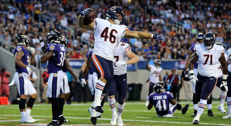 Chicago Bears fullback Michael Burton (46) reacts to scoring a touchdown against the Baltimore Ravens in the first half at Tom Benson Hall of Fame Stadium.