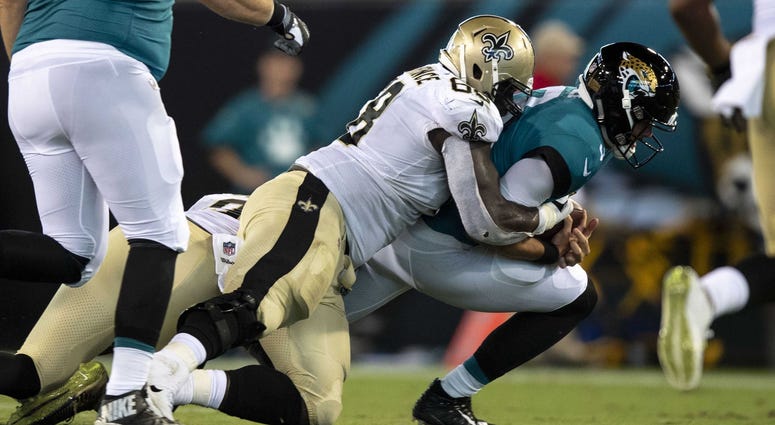 Aug 9, 2018; Jacksonville, FL, USA; Jacksonville Jaguars quarterback Tanner Lee (3) is sacked by New Orleans Saints defensive tackle Devaroe Lawrence (68) in the second half of the game at TIAA Bank Field. Aug 9, 2018; Jacksonville, FL, USA; Jacksonville Jaguars quarterback Tanner Lee (3) is sacked by New Orleans Saints defensive tackle Devaroe Lawrence (68) in the second half of the game at TIAA Bank Field.
