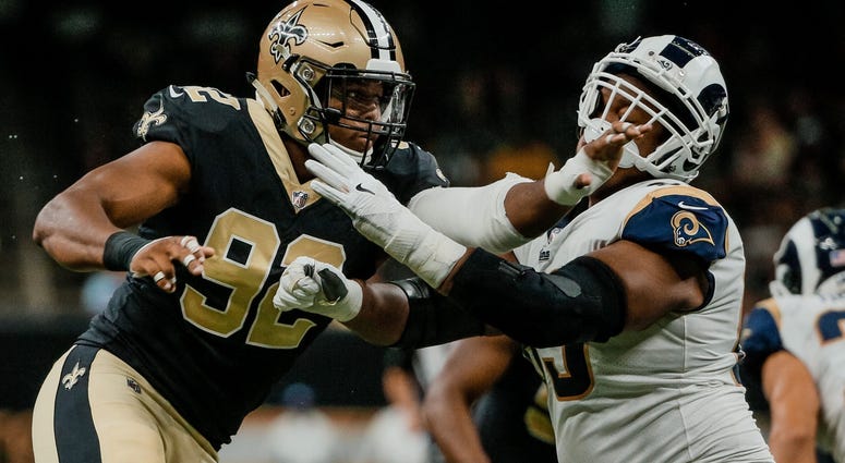 Aug 30, 2018; New Orleans, LA, USA; New Orleans Saints defensive end Marcus Davenport (92) works against Los Angeles Rams offensive tackle Darrell Williams (63) during the first half of a preseason game at the Mercedes-Benz Superdome. Aug 30, 2018; New Orleans, LA, USA; New Orleans Saints defensive end Marcus Davenport (92) works against Los Angeles Rams offensive tackle Darrell Williams (63) during the first half of a preseason game at the Mercedes-Benz Superdome.