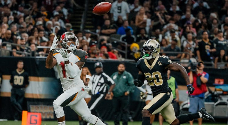 Sep 9, 2018; New Orleans, LA, USA; Tampa Bay Buccaneers wide receiver DeSean Jackson (11) catches a touchdown over New Orleans Saints cornerback Ken Crawley (20) during the fourth quarter of a game at the Mercedes-Benz Superdome. The Buccaneers defeated t Sep 9, 2018; New Orleans, LA, USA; Tampa Bay Buccaneers wide receiver DeSean Jackson (11) catches a touchdown over New Orleans Saints cornerback Ken Crawley (20) during the fourth quarter of a game at the Mercedes-Benz Superdome. The Buccaneers defeated t