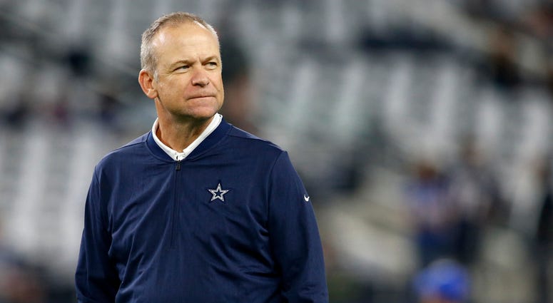 Dallas Cowboys offensive coordinator Scott Linehan on the field before the game against the New York Giants at AT&T Stadium.