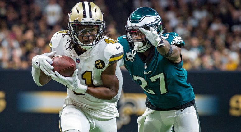 Nov 18, 2018; New Orleans, LA, USA; New Orleans Saints running back Alvin Kamara (41) runs the ball against Philadelphia Eagles strong safety Malcolm Jenkins (27) at the Mercedes-Benz Superdome Nov 18, 2018; New Orleans, LA, USA; New Orleans Saints running back Alvin Kamara (41) runs the ball against Philadelphia Eagles strong safety Malcolm Jenkins (27) at the Mercedes-Benz Superdome