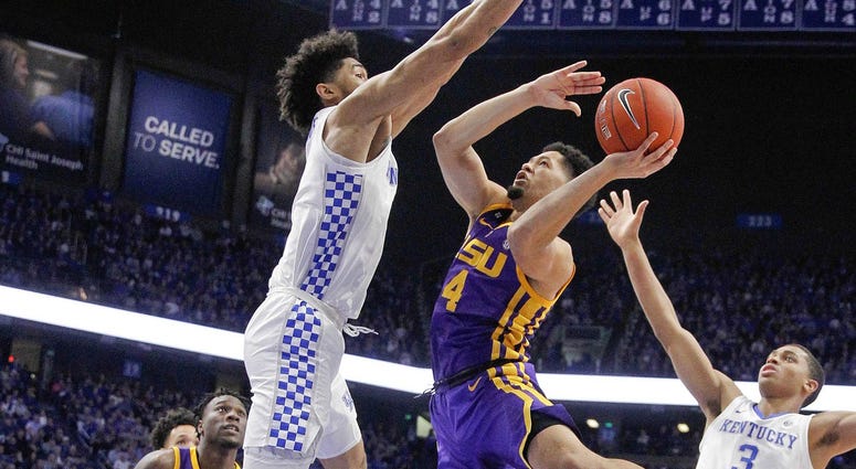 Feb 12, 2019; Lexington, KY, USA; LSU Tigers guard Skylar Mays (4) shoots the ball against Kentucky Wildcats forward Nick Richards (4) in the first half at Rupp Arena. Feb 12, 2019; Lexington, KY, USA; LSU Tigers guard Skylar Mays (4) shoots the ball against Kentucky Wildcats forward Nick Richards (4) in the first half at Rupp Arena.