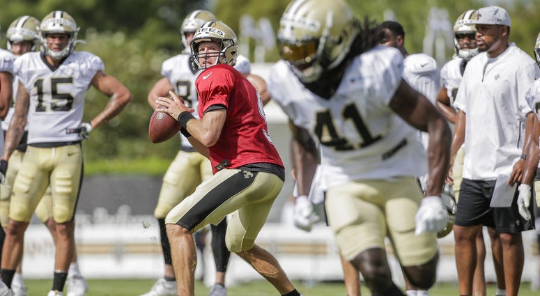 Jul 28, 2019; Metairie, LA, USA; New Orleans Saints quarterback Drew Brees (9) throws to running back Alvin Kamara (41) during training camp at the Ochsner Sports Performance Center. Jul 28, 2019; Metairie, LA, USA; New Orleans Saints quarterback Drew Brees (9) throws to running back Alvin Kamara (41) during training camp at the Ochsner Sports Performance Center.