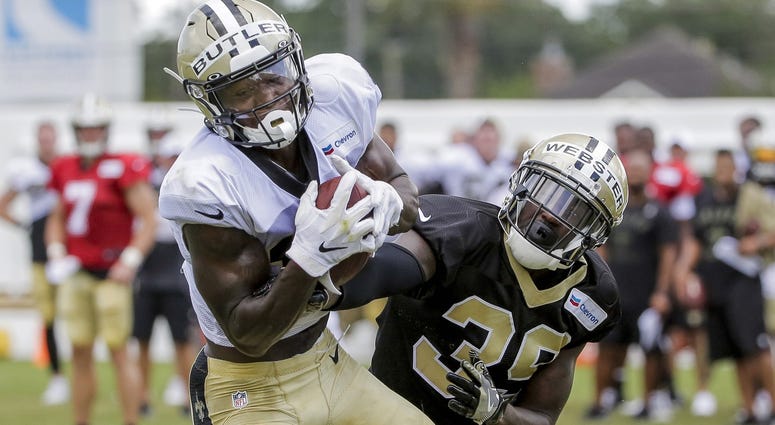 Jul 28, 2019; Metairie, LA, USA; New Orleans Saints wide receiver Emmanuel Butler (17) catches a pass over defensive back Kayvon Webster (39) during training camp at the Ochsner Sports Performance Center. Jul 28, 2019; Metairie, LA, USA; New Orleans Saints wide receiver Emmanuel Butler (17) catches a pass over defensive back Kayvon Webster (39) during training camp at the Ochsner Sports Performance Center.