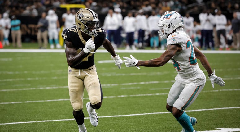 Aug 29, 2019; New Orleans, LA, USA; New Orleans Saints wide receiver Emmanuel Butler (17) runs past Miami Dolphins cornerback Torry McTyer (24) on a touchdown play during a preseason game at the Mercedes-Benz Superdome. Aug 29, 2019; New Orleans, LA, USA; New Orleans Saints wide receiver Emmanuel Butler (17) runs past Miami Dolphins cornerback Torry McTyer (24) on a touchdown play during a preseason game at the Mercedes-Benz Superdome.