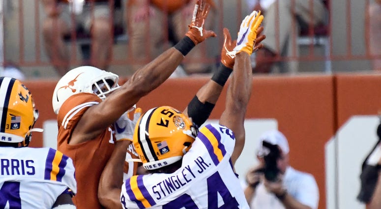Louisiana State Tigers cornerback Derek Stingley Jr. (24) defends a pass intended for Texas Longhorns Collin Johnson (9) at Darrell K Royal-Texas Memorial Stadium.