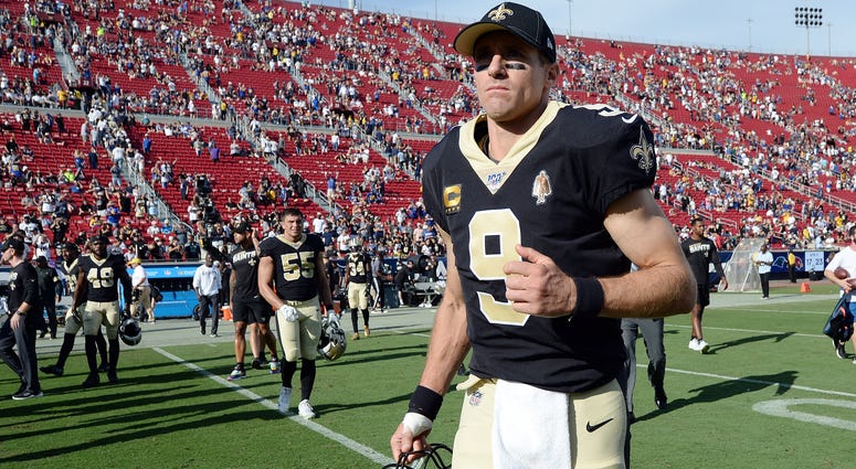 New Orleans Saints quarterback Drew Brees (9) leaves the field following the 27-9 loss against the Los Angeles Rams at Los Angeles Memorial Coliseum.