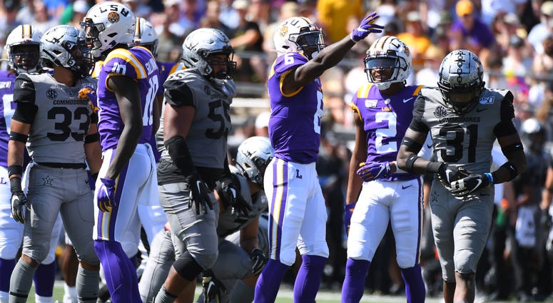 LSU Tigers wide receiver Terrace Marshall Jr. (6) celebrates after a first down reception during the first half against the Vanderbilt Commodores at Vanderbilt Stadium.