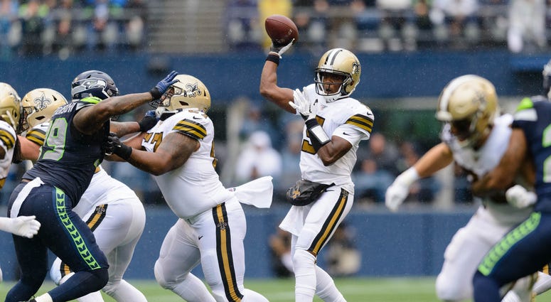 New Orleans Saints quarterback Teddy Bridgewater (5) passes the ball against the Seattle Seahawks during the first half at CenturyLink Field.