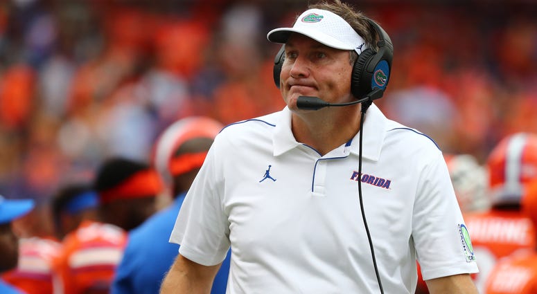 Florida Gators head coach Dan Mullen looks on against the Towson Tigers during the second quarter at Ben Hill Griffin Stadium.