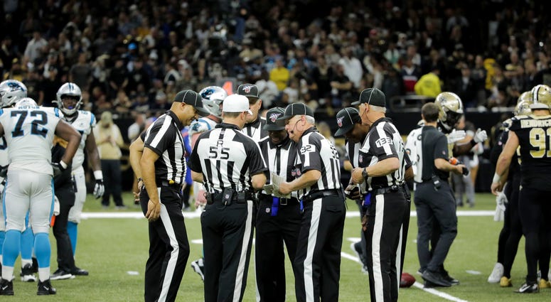 NFL officials during the Saints/Panthers game