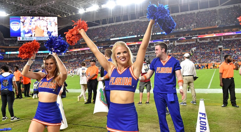 Florida Gators cheerleaders cheers on during the second half against the Virginia Cavaliers in the 2019 Orange Bowl game at Hard Rock Stadium.