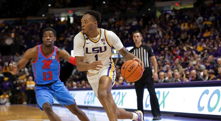 LSU Tigers guard Javonte Smart (1) drives past Mississippi Rebels guard Bryce Williams (13) during the second half at the Maravich Assembly Center.